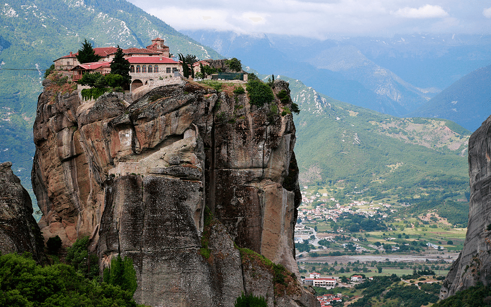 Meteora monastery perched on towering rock pillars in Greece