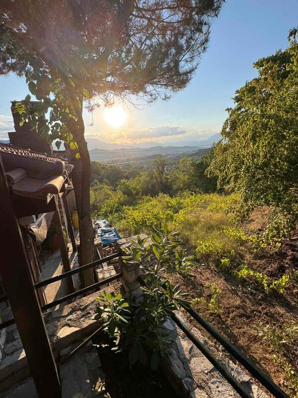 Sunset view from taverna terrace overlooking Meteora