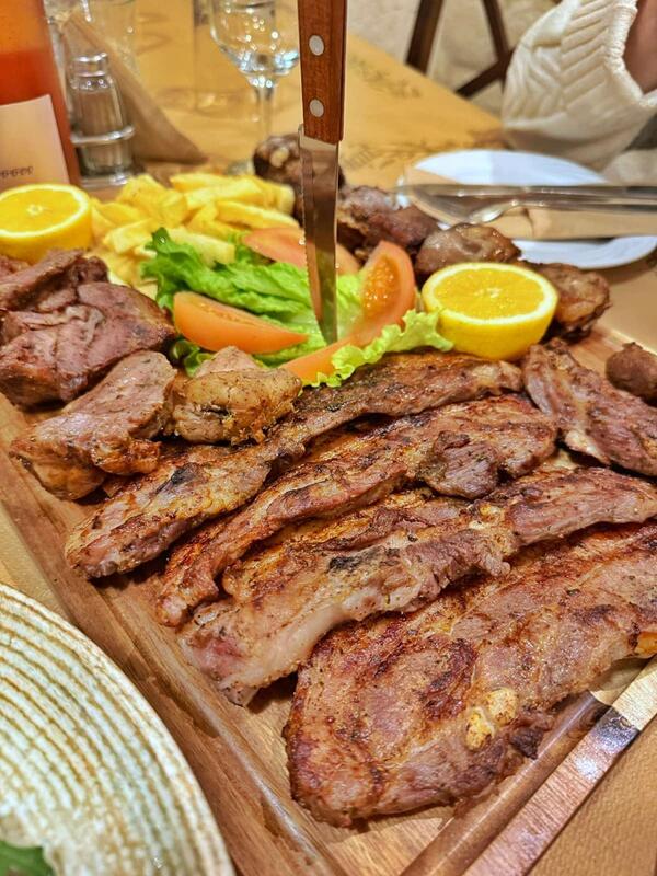 Warm taverna atmosphere welcoming guests