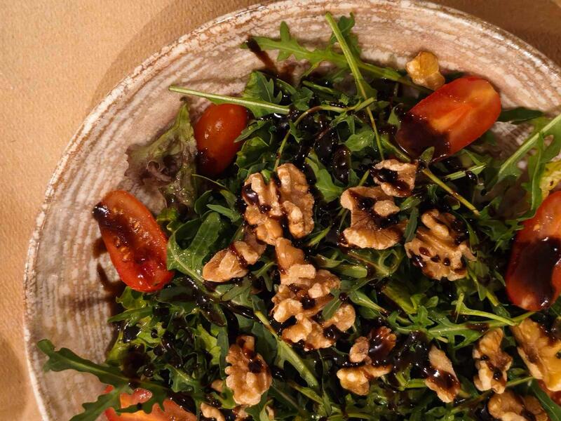 Traditional Greek dishes served on warm afternoon at the taverna